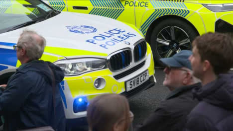 Close-up-Police-Car-at-COP-26-Protest