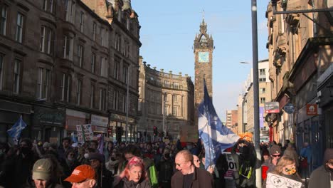 Handheld-Shot-of-Climate-Change-Protestors-Marching-In-Glasgow