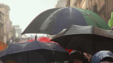 Handheld-Shot-of-Umbrellas-During-Climate-Change-Protests-In-Glasgow