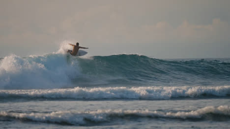 Long-Shot-of-a-Surfer-Surfing-in-the-Ocean-in-Bali