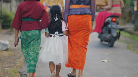 Mid-Shot-of-Family-Walking-Through-Bali