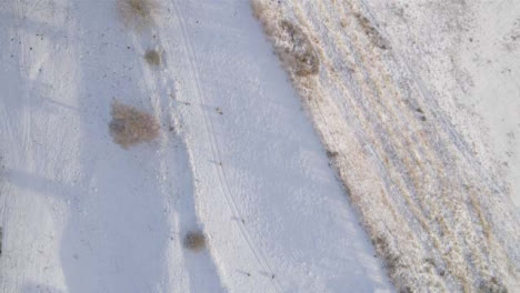 Drone-Shot-Looking-Down-On-Snow-Covered-Fields-Part-2-of-2