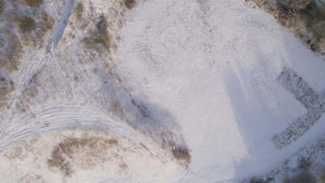 Drone-Shot-Looking-Down-On-Snowy-Fields-Part-1-of-2