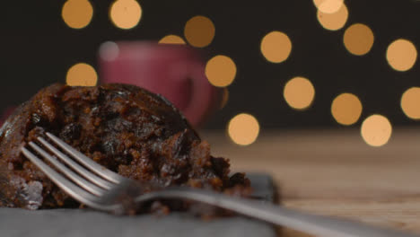 Tracking-Shot-of-Fork-Picking-Piece-of-Christmas-Pudding