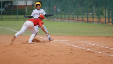 Long-Shot-of-Softball-Player-Reaching-a-Base