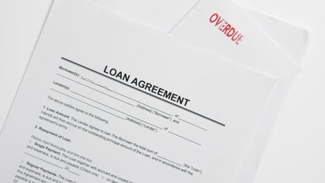 Overhead-Shot-of-Loan-Agreement-Spinning