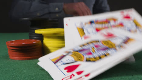 Mid-Shot-of-Someone-Throwing-Cards