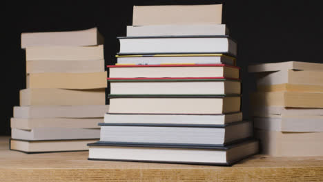 Tracking-Shot-of-Books-Stacked-01