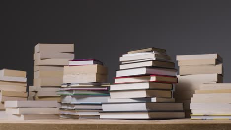 Low-Angle-Shot-of-Piles-of-Books-01