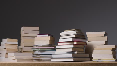 Low-Angle-Shot-of-Piles-of-Books-02