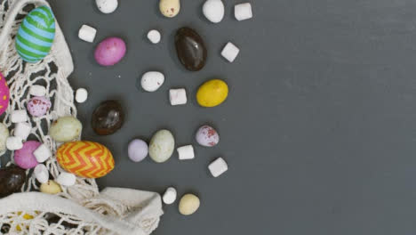 Tracking-Shot-of-Assorted-Easter-Confectionary-with-Copy-Space