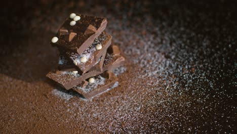 High-Angle-Shot-of-Rotating-Chunks-of-Premium-Looking-Chocolate