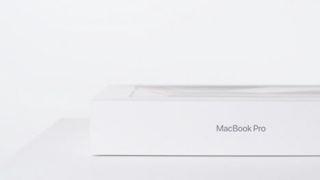 Sliding-Shot-of-Brand-New-Macbook-Pro-02