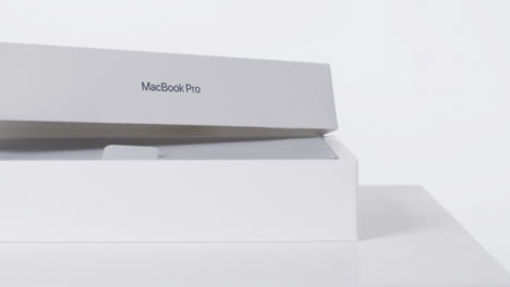 Sliding-Shot-of-Brand-New-Macbook-Pro-03