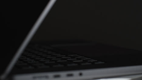 Close-Up-Shot-of-Rotating-Brand-New-Apple-MacBook-Pro-04