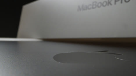 Tracking-Shot-of-Brand-New-Apple-MacBook-Pro-M1-Being-Unboxed