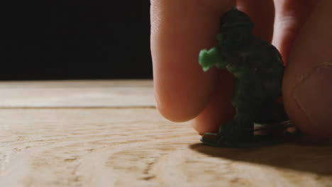 Tracking-Shot-Approaching-a-Lone-Toy-Soldier-with-Copy-Space