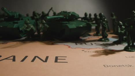 Tracking-Shot-of-Toy-Soldiers-On-Map-of-Ukraine-08