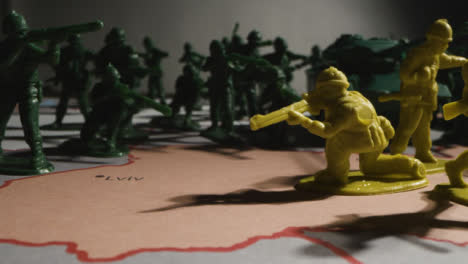 Tracking-Shot-of-Toy-Soldiers-On-Map-of-Ukraine-10