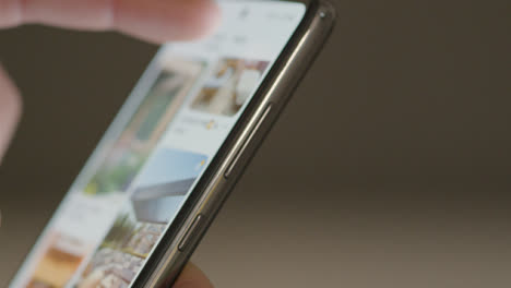 Close-Up-of-Scrolling-on-Pinterest-on-a-Phone