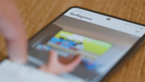 Close-of-Browsing-Instagram-App-on-Mobile-Phone