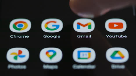 Close-Up-Shot-of-Finger-Tapping-Google-Mail-App-On-a-Smartphone