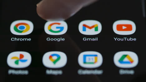 Close-Up-Shot-of-Finger-Tapping-Google-Search-App-On-a-Smartphone