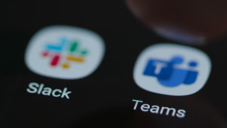 Close-Up-Shot-of-Finger-Tapping-the-Microsoft-Teams-App-On-a-Smartphone