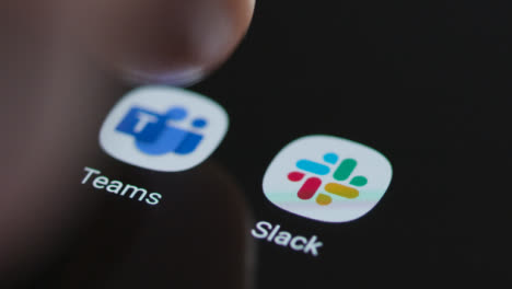 Close-Up-Shot-of-a-Finger-Tapping-the-Microsoft-Teams-App-On-Smartphone-Screen