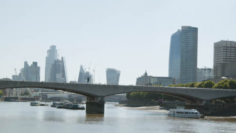 Waterloo-Bridge-With-Commuter-Traffic-And-London-City-Skyline-In-Background-2