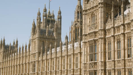 Casas-Del-Parlamento-Puente-De-Westminster-Con-Bandera-Union-Jack-Londres-Reino-Unido-2