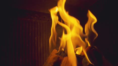 Close-Up-Flames-From-Fire-Made-From-Wood-Logs-Burning-In-Fireplace-At-Home-2