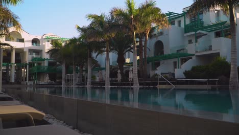 Empty-Holiday-Hotel-Swimming-Pool-At-Dusk-1