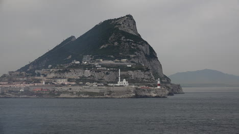 Gibraltar-Rock-End-With-Lighthouse-And-Mosque-Drift-Past