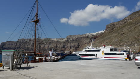 Greece-Santorini-Docks-With-Boats-And-Cloud