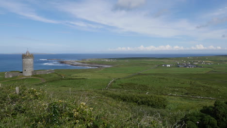 Ireland-County-Clare-Doonagore-Castle-And-Doolin-Town-Beyond