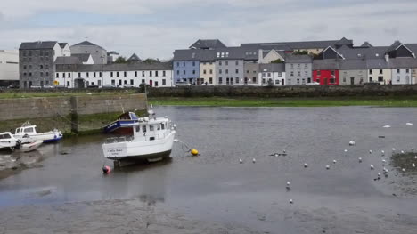 Ireland-Galway-Bay-Boats-At-Low-Tide-With-City-On-The-Opposite-Bank-Pan