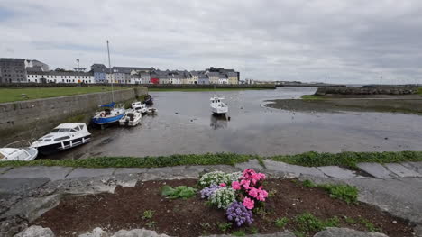 Ireland-Galway-Bay-Boats-At-Low-Tide-With-Flower-By-Walkway