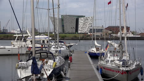 Northern-Ireland-Belfast-Titanic-Museum-And-Boats-In-Marina-With-Man-