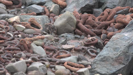 Canada-Nova-Scotia-Rusted-Chain-Links-And-Rocks