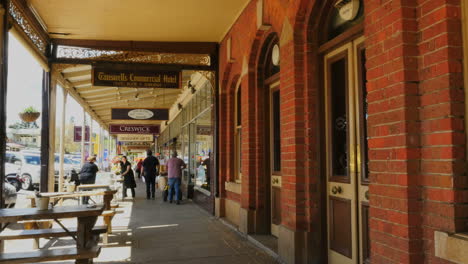 Australia-Beechworth-People-Walking-By-Shops