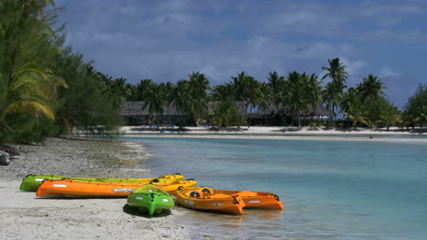 Aitutaki-Colorful-Kayaks-By-Lagoon