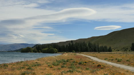 New-Zealand-Path-And-Wave-Clouds-Lake-Dunstan