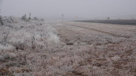 Texas-Icy-Roadside-With-Car-Driving-By