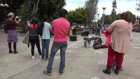 Chile-Chiloe-Castro-Tourists-Standing-In-Plaza