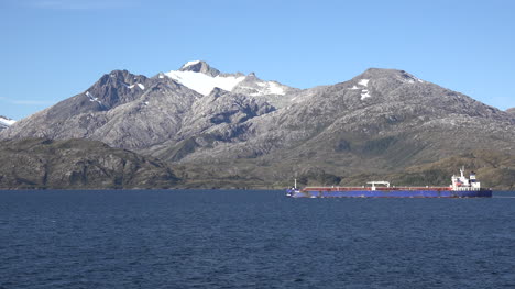 Chile-Strait-Of-Magellan-Freighter-Passes-Peak-With-Snow