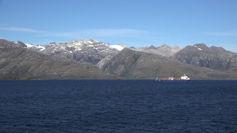 Chile-Strait-Of-Magellan-Zooms-On-Freighter-Plying-Through-Fjord