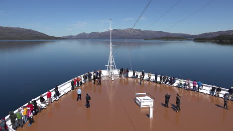 Chile-Passengers-On-Bow-Of-Ship