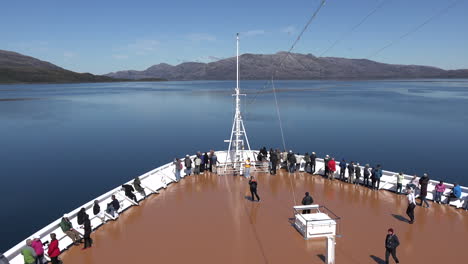 Chile-Zooms-On-Front-Of-Ship-Bow-In-Fjord