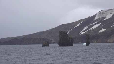 Antarctica-Passing-Sea-Stacks-Deception-Island